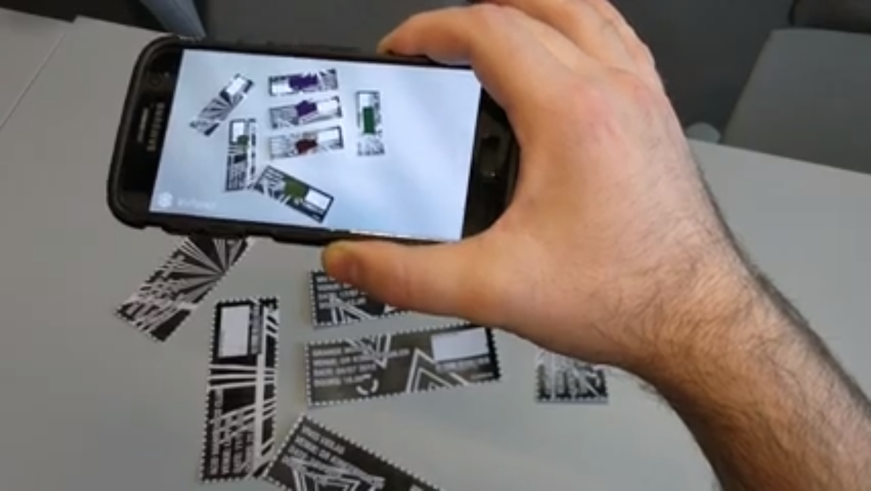 Playing Tickets in action: When the phone recognizes a ticket, it shows an instrument superimposed on the ticket and plays an associated audio track.